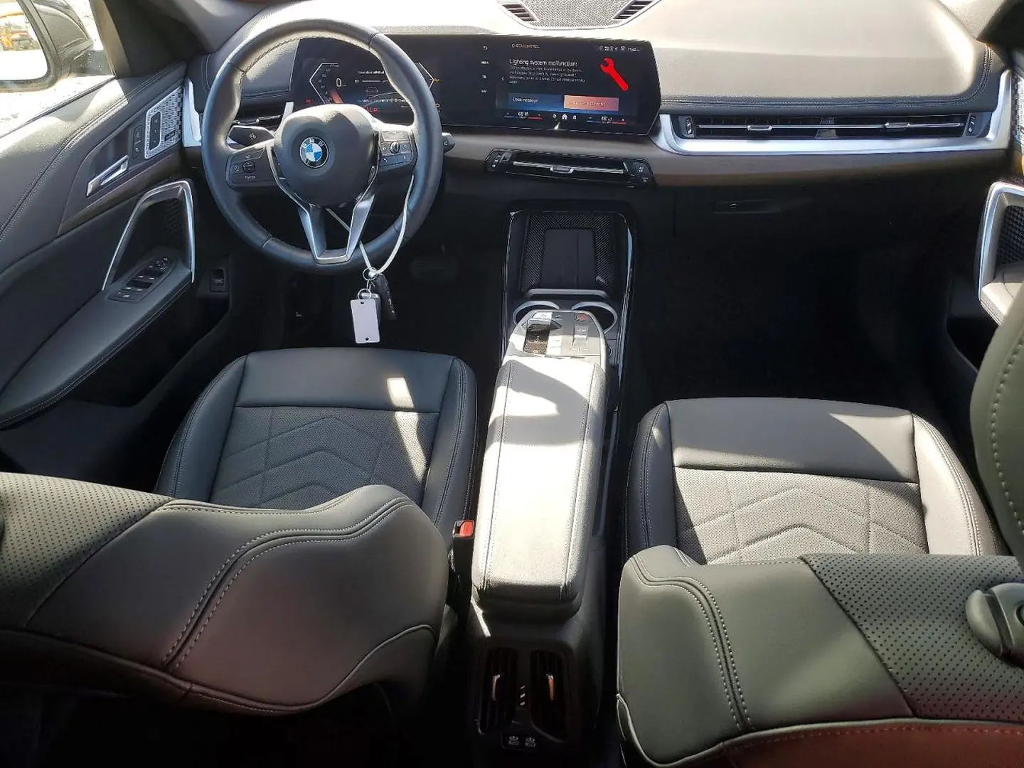 BMW X1 U11 czarna wnętrze deska rozdzielcza AMUMotors